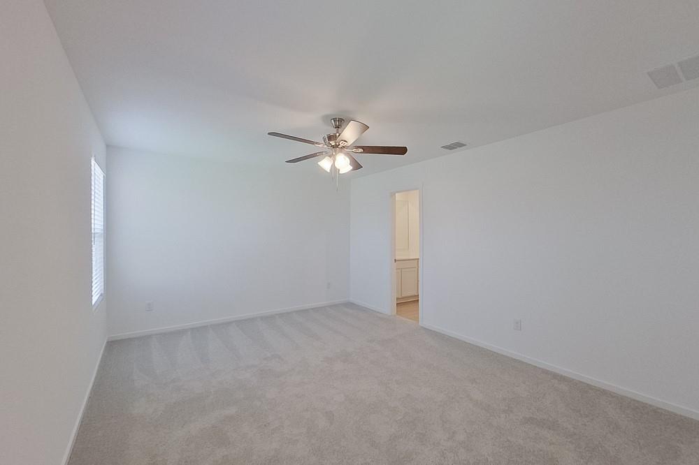 2908 Yellow Pine Avenue Fort Worth, TX 76179 - Photo 13 of 23 a view of a chandelier fan and window
