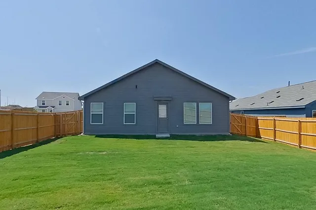 a view of a house with swimming pool