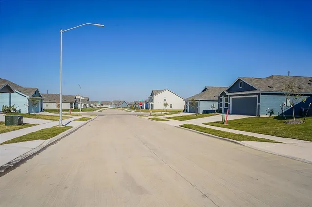 a view of a lake with boats next to a building