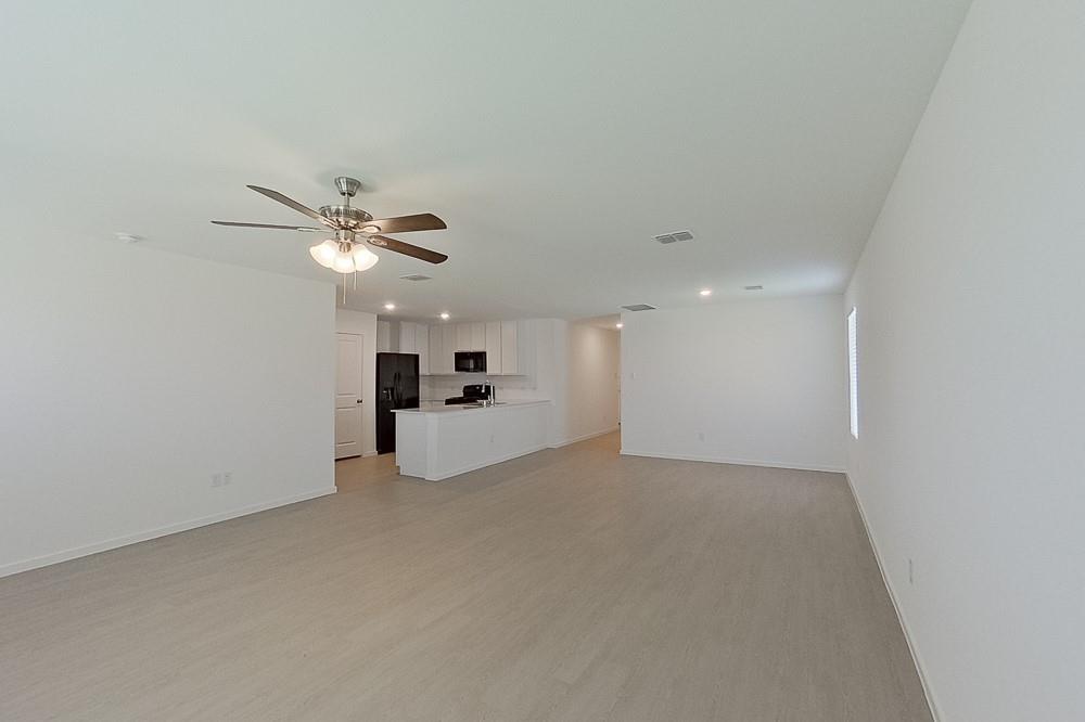 2908 Yellow Pine Avenue Fort Worth, TX 76179 - Photo 3 of 23 a view of a livingroom and a chandelier fan