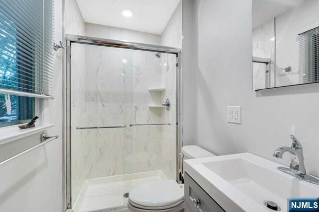 32 Rock Road Englewood Cliffs, NJ 07632 - Photo 17 of 30 a bathroom with a sink toilet and shower