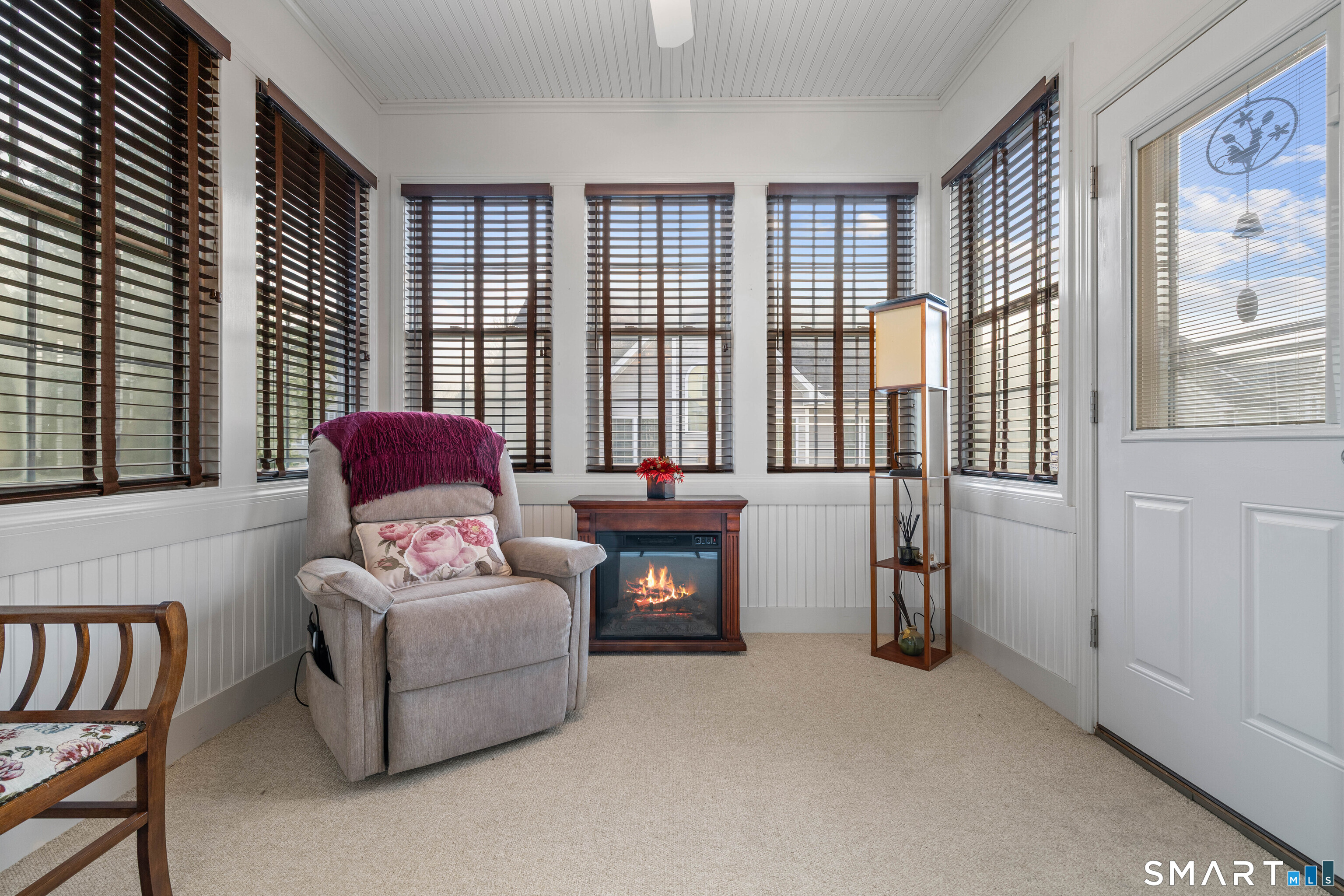 24 Phillips Farm Road, Unit 24 East Hartford, CT 06118 - Photo 20 of 34 a living room with furniture and a flat screen tv
