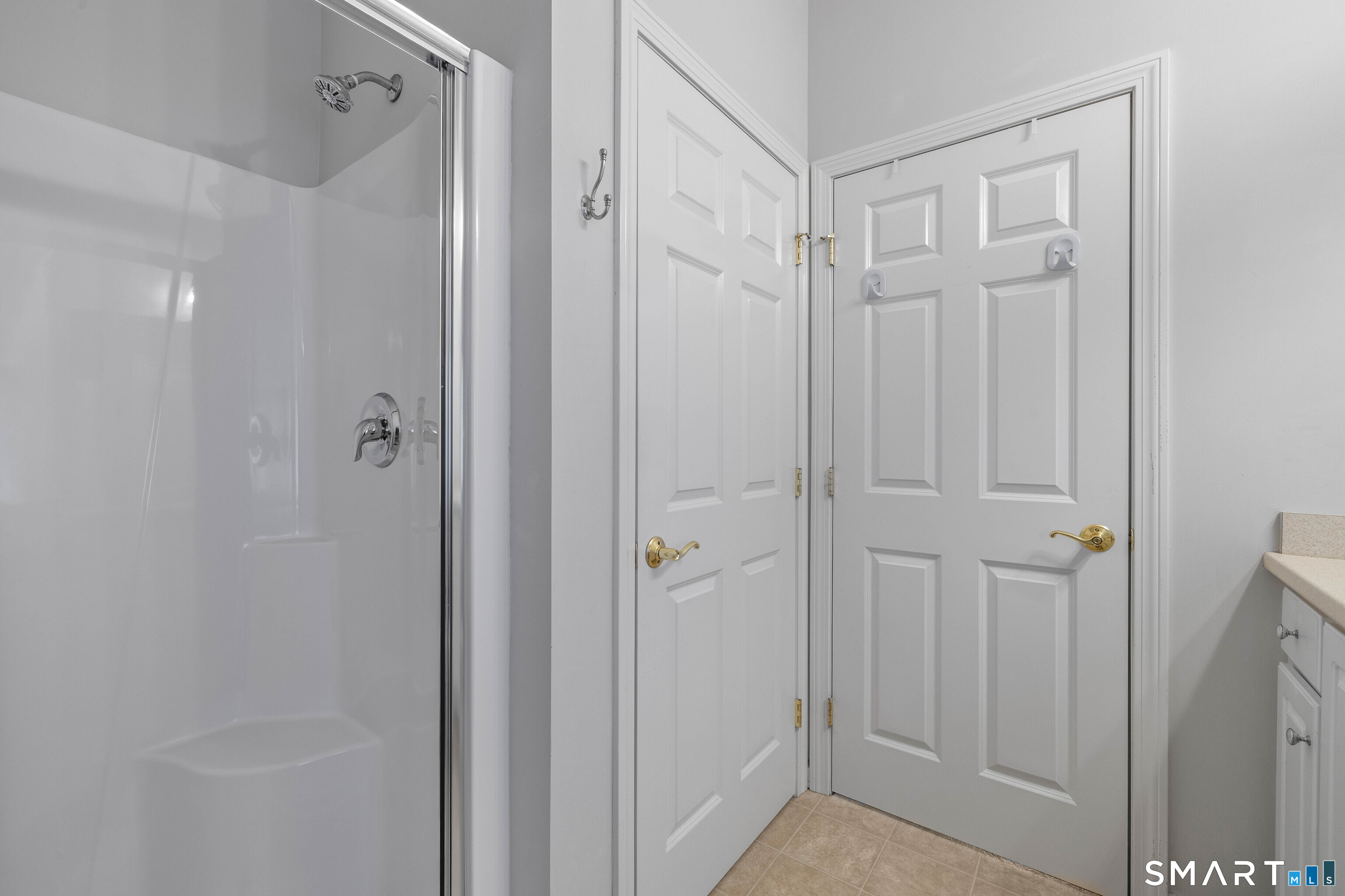 24 Phillips Farm Road, Unit 24 East Hartford, CT 06118 - Photo 26 of 34 a bathroom with a shower