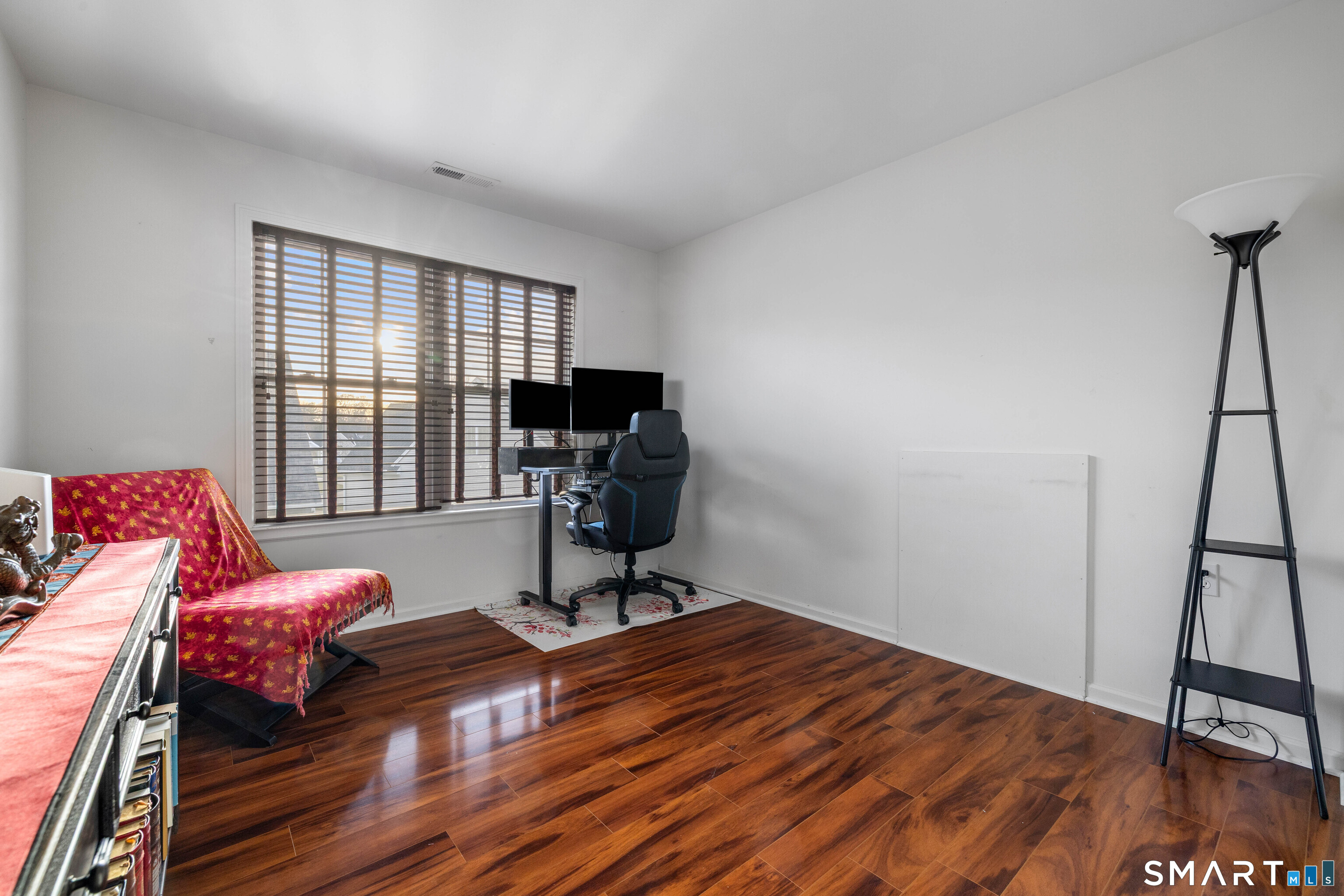 24 Phillips Farm Road, Unit 24 East Hartford, CT 06118 - Photo 29 of 34 a living room with furniture and a window
