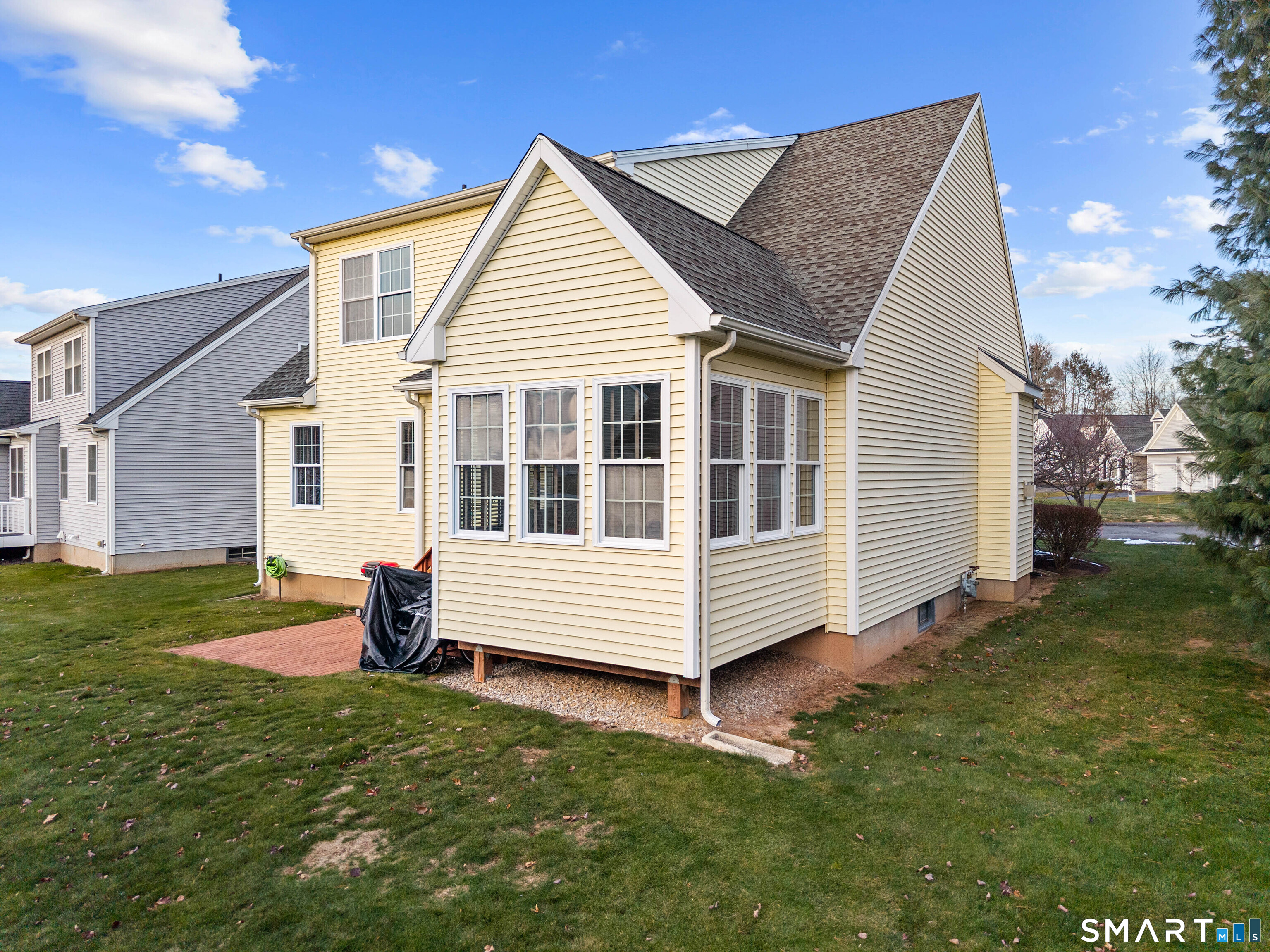 24 Phillips Farm Road, Unit 24 East Hartford, CT 06118 - Photo 34 of 34 a view of a house with a yard