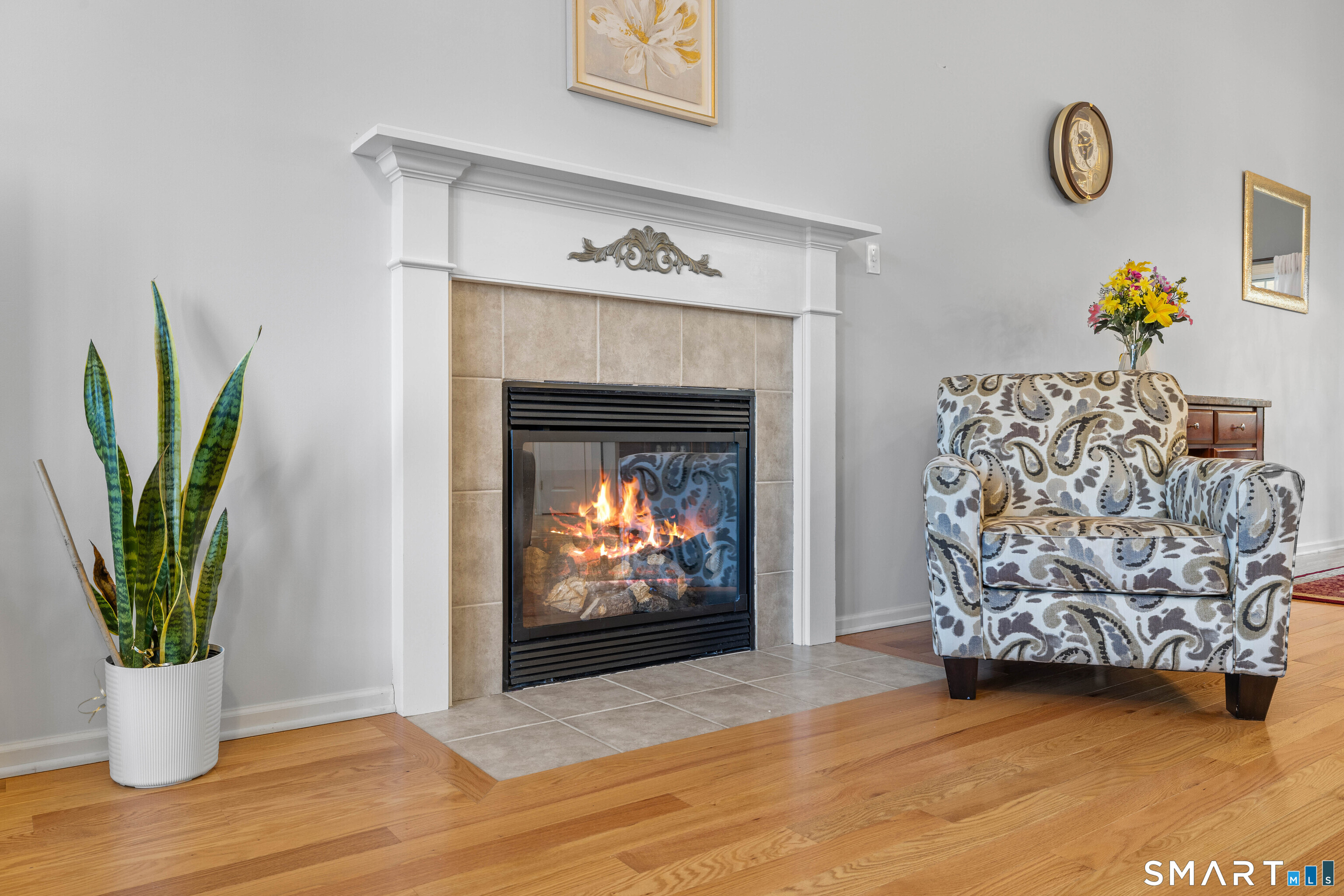 24 Phillips Farm Road, Unit 24 East Hartford, CT 06118 - Photo 9 of 34 a view of living room with furniture and a fireplace