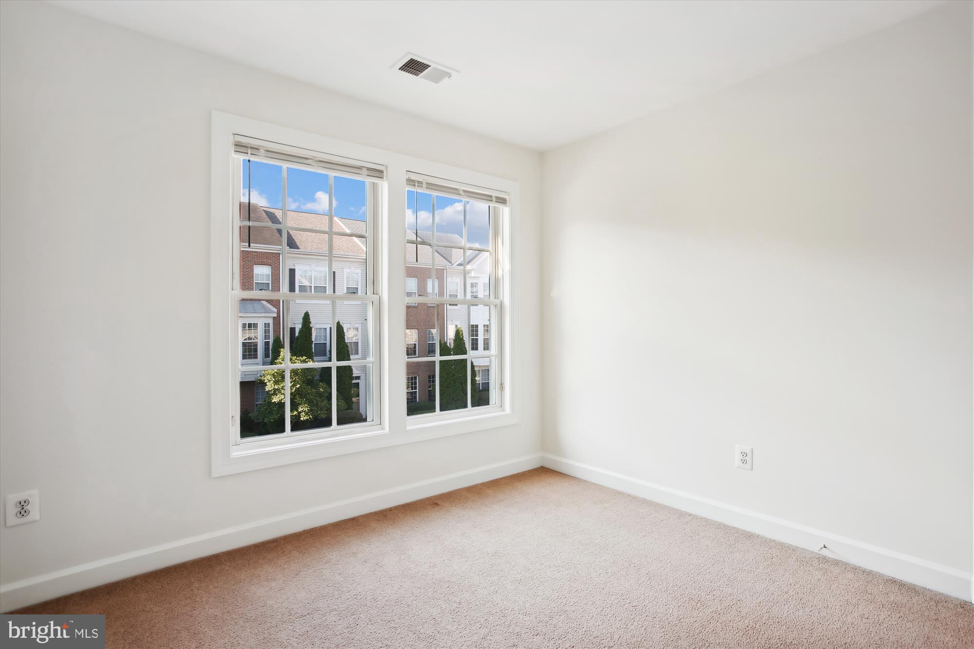 5803 Summers Grove Road Alexandria, VA 22304 - Photo 16 of 43 an empty room with windows