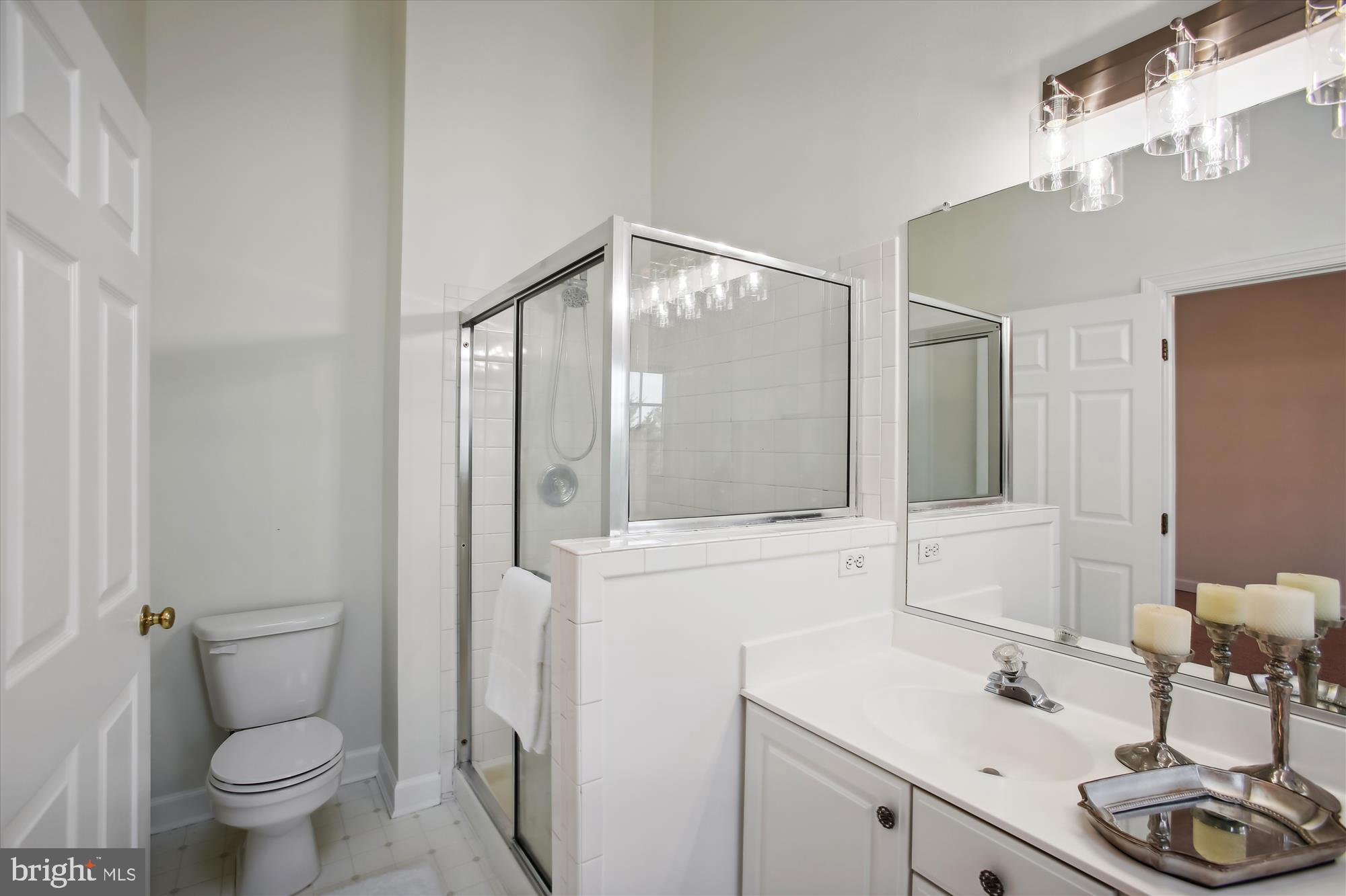 5803 Summers Grove Road Alexandria, VA 22304 - Photo 17 of 43 a bathroom with a sink toilet and shower