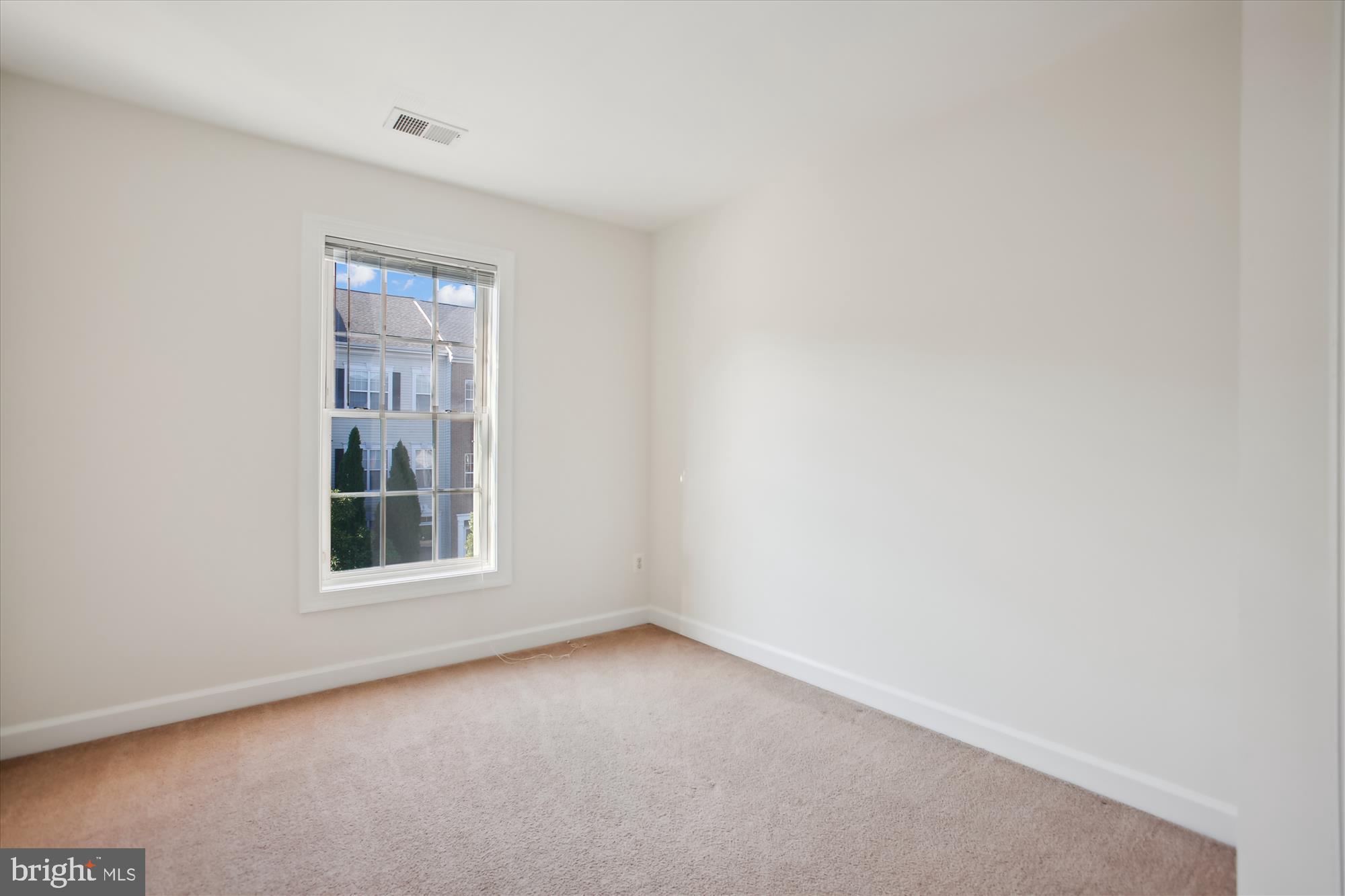 5803 Summers Grove Road Alexandria, VA 22304 - Photo 19 of 43 an empty room with windows