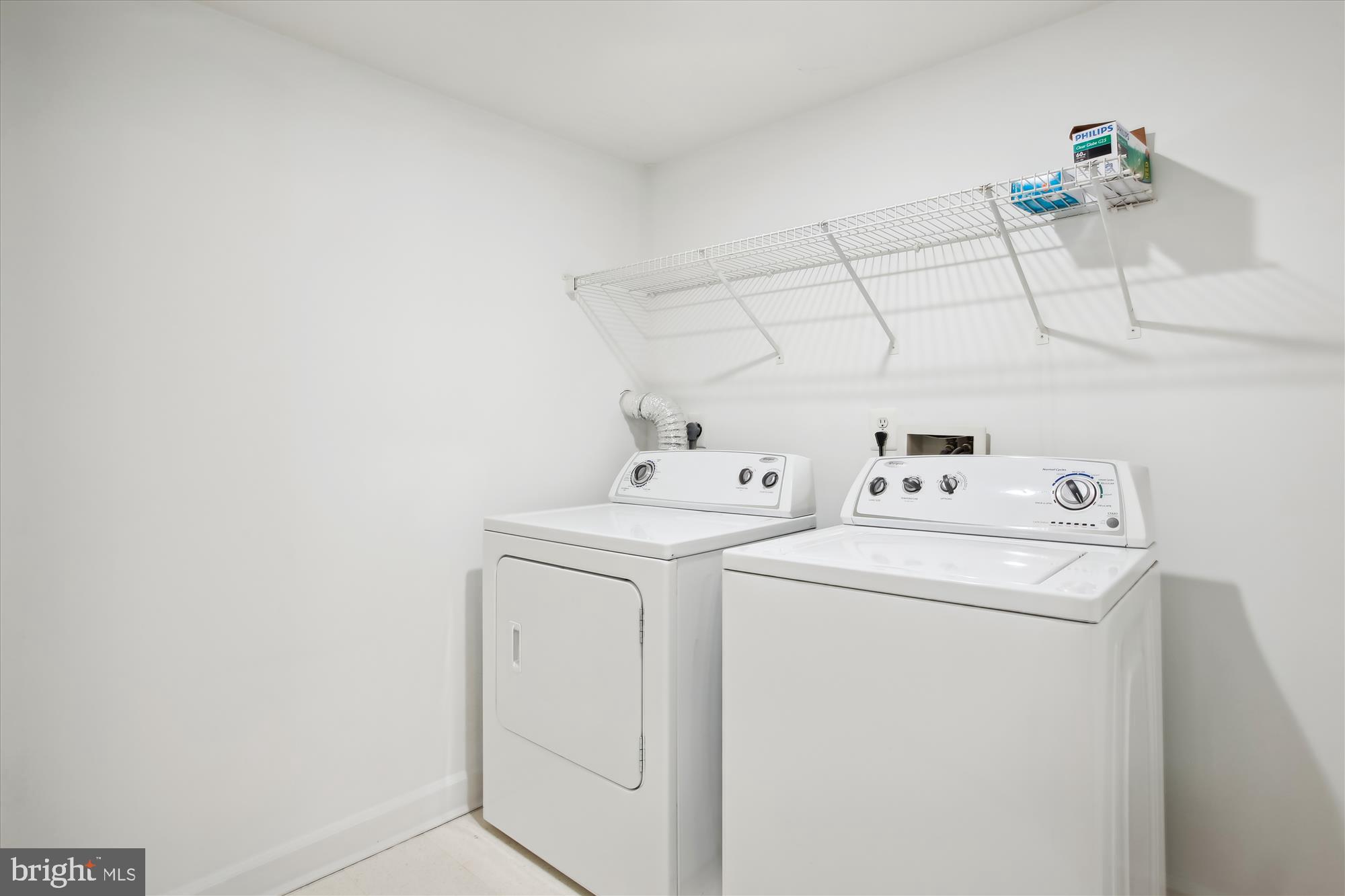 5803 Summers Grove Road Alexandria, VA 22304 - Photo 29 of 43 a utility room with dryer and washer