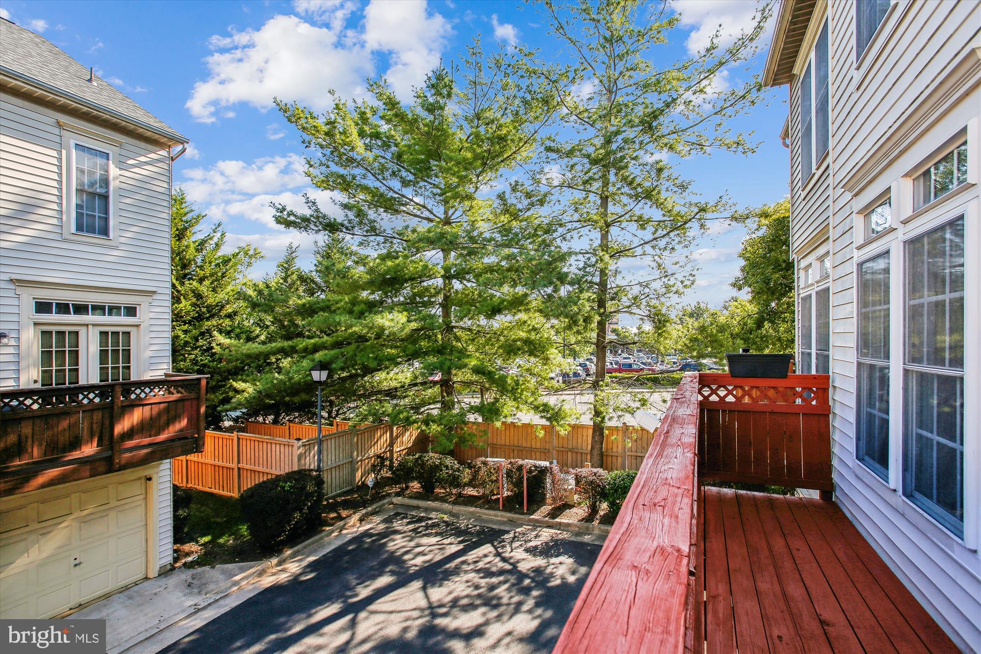 5803 Summers Grove Road Alexandria, VA 22304 - Photo 32 of 43 a view of balcony with furniture and wooden floor