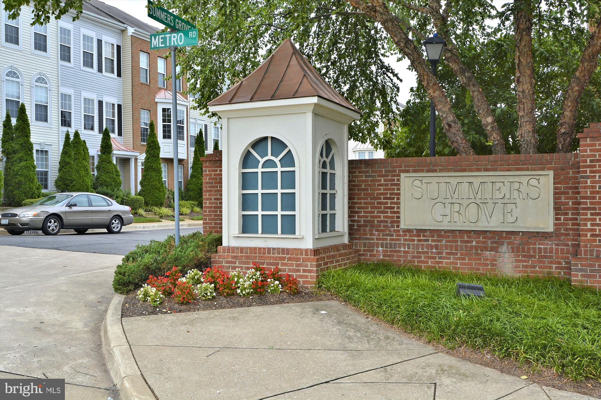 5803 Summers Grove Road Alexandria, VA 22304 - Photo 37 of 43 a front view of a house with garden