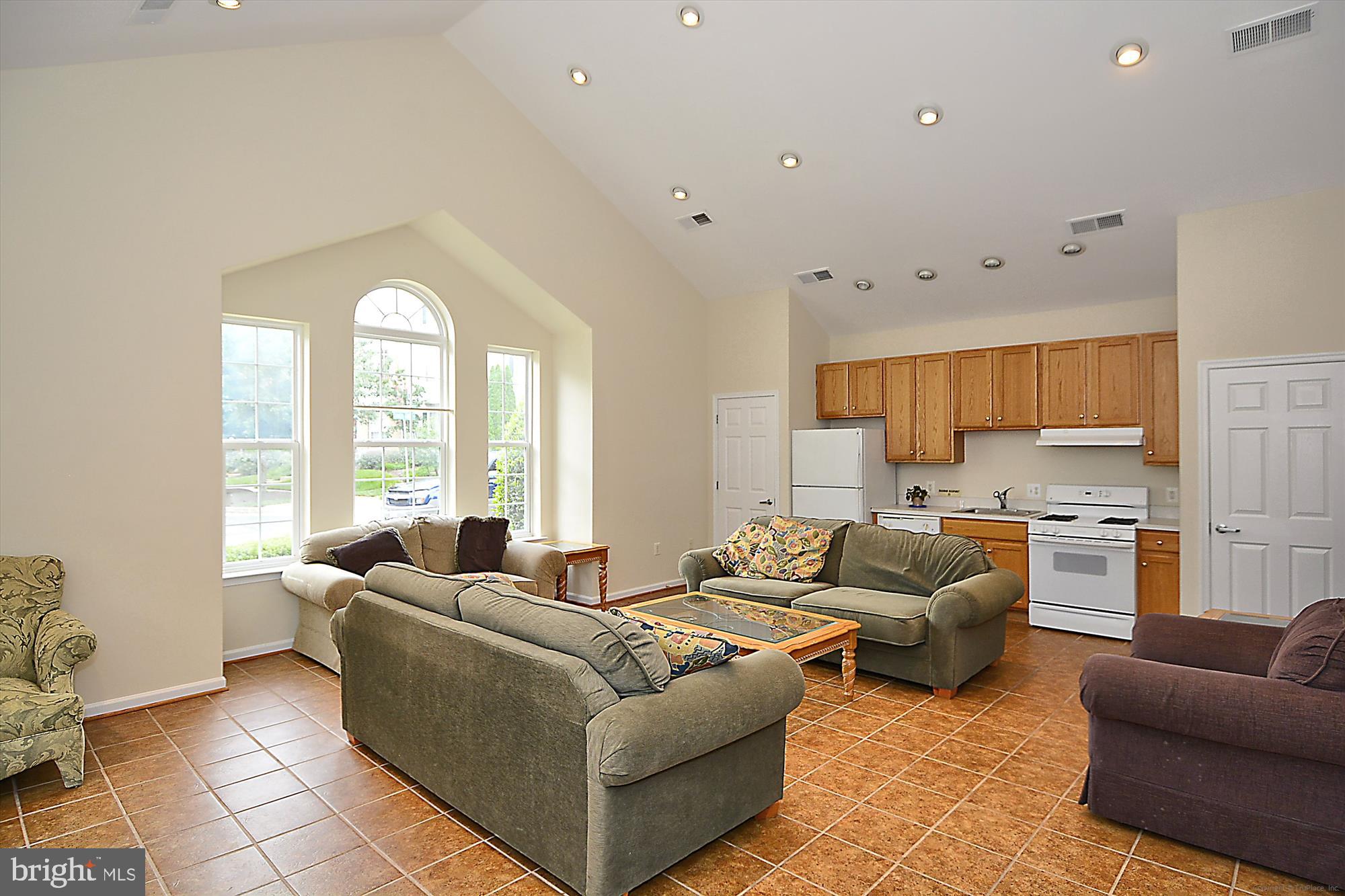 5803 Summers Grove Road Alexandria, VA 22304 - Photo 41 of 43 a living room with furniture and a large window