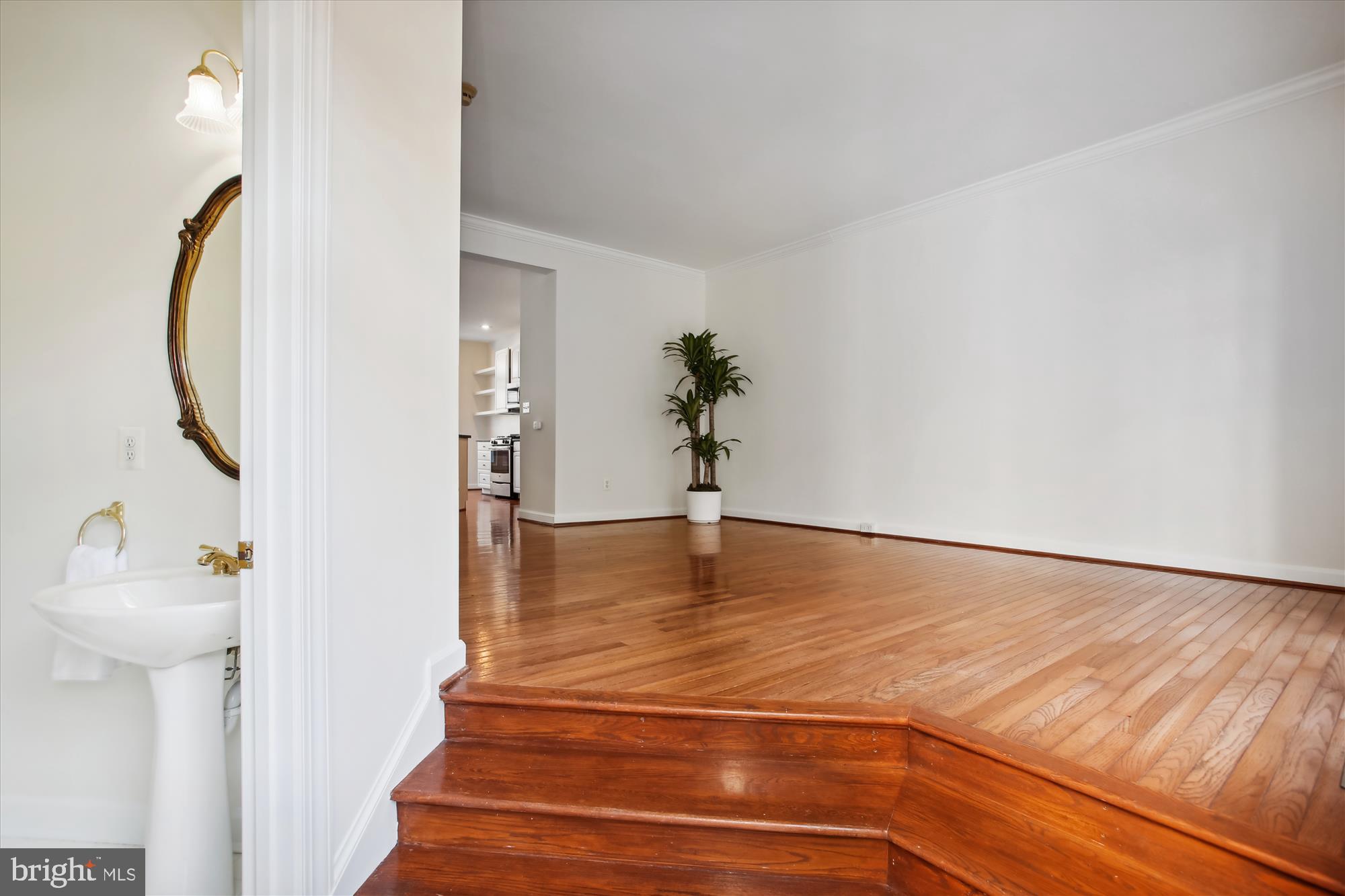 5803 Summers Grove Road Alexandria, VA 22304 - Photo 6 of 43 a view of an entryway with wooden floor