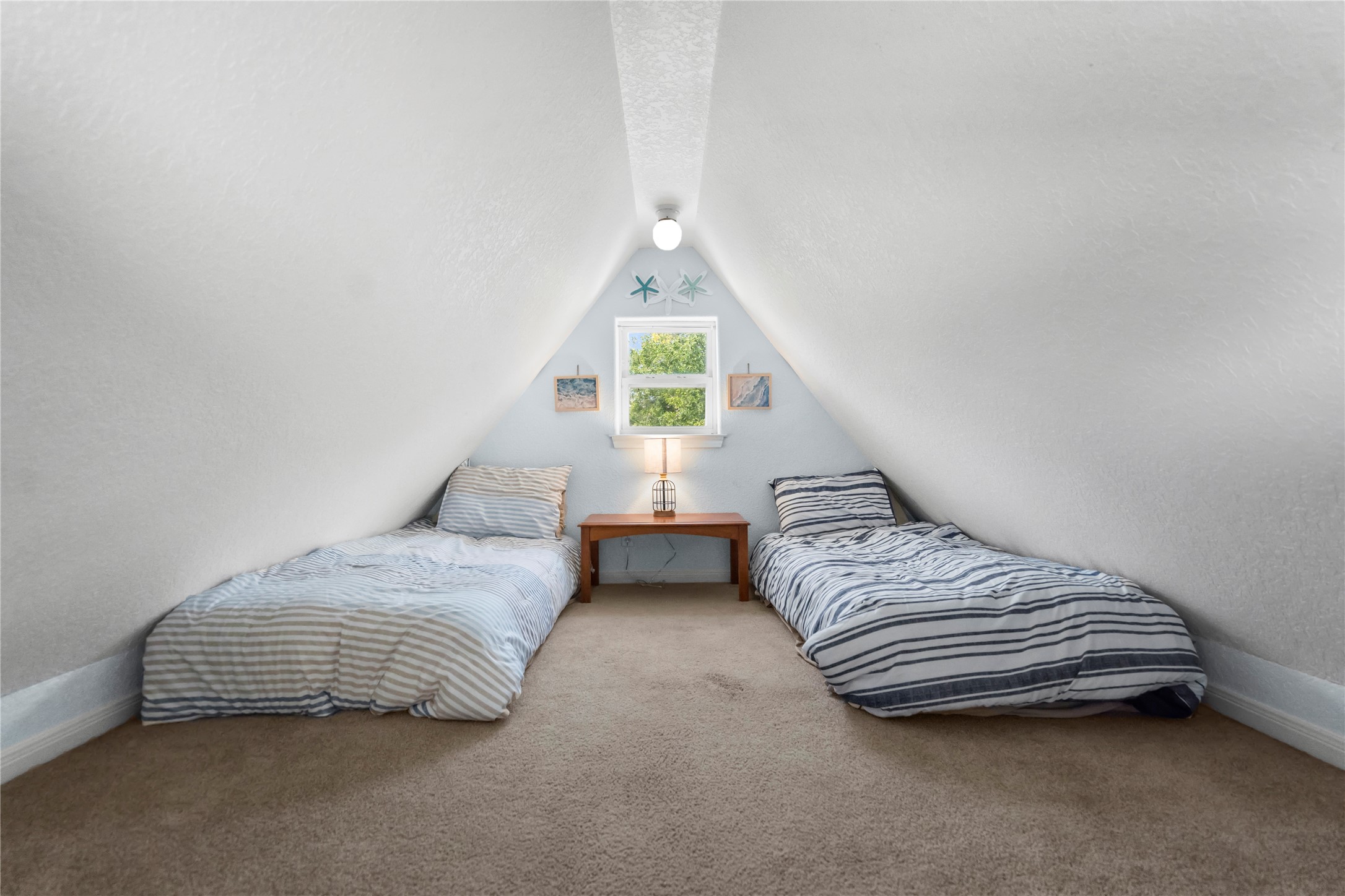 120 Grove Road, Unit 4 Kemah, TX 77565 - Photo 18 of 20 a bedroom with bed and a window