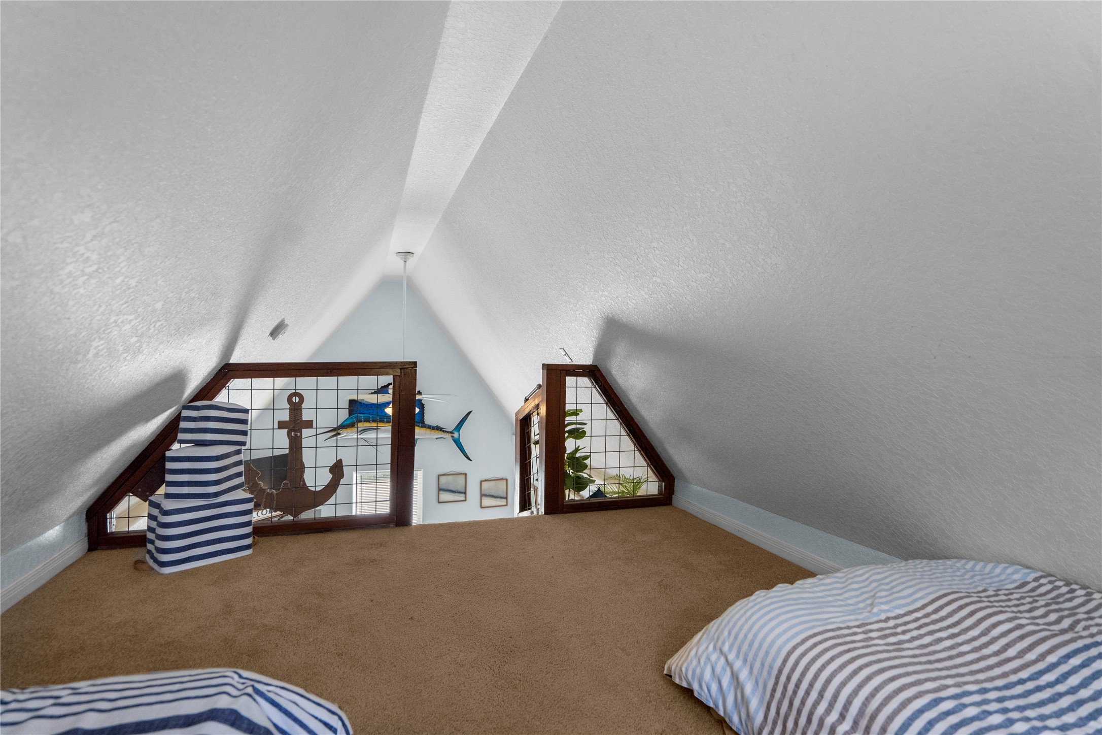 120 Grove Road, Unit 4 Kemah, TX 77565 - Photo 19 of 20 a bedroom with bed and wooden floor