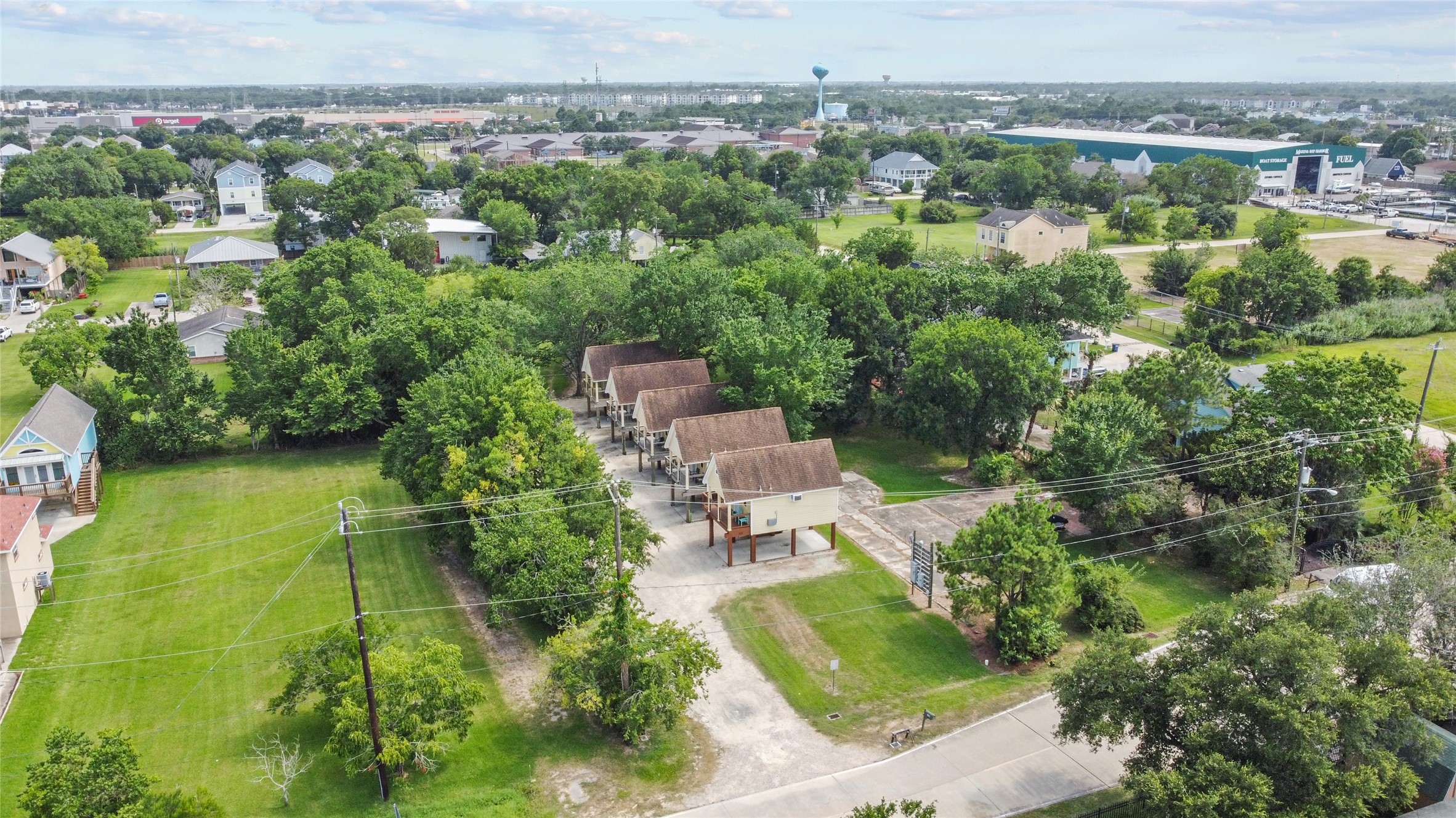 120 Grove Road, Unit 4 Kemah, TX 77565 - Photo 2 of 20 an aerial view of a house with a yard and lake view