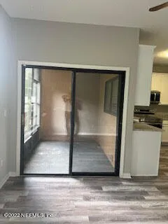 a bathroom with a sink vanity and mirror