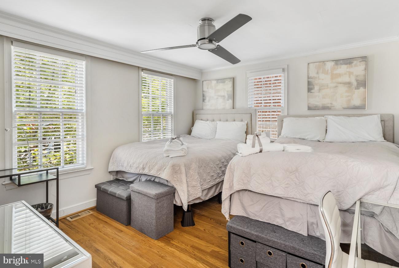 3424 O Street Northwest Washington, DC 20007 - Photo 19 of 29 a spacious bedroom with two beds and a window