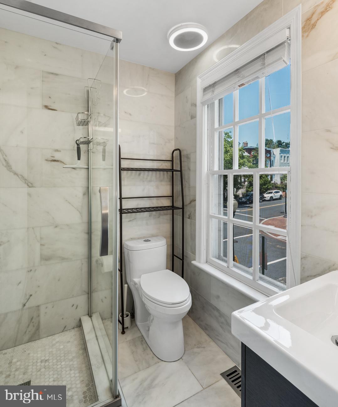 3424 O Street Northwest Washington, DC 20007 - Photo 22 of 29 a bathroom with a toilet and a shower