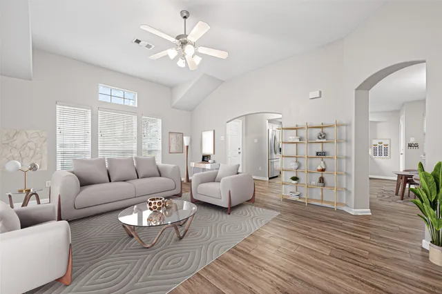a kitchen with stainless steel appliances a stove top oven a sink and cabinets