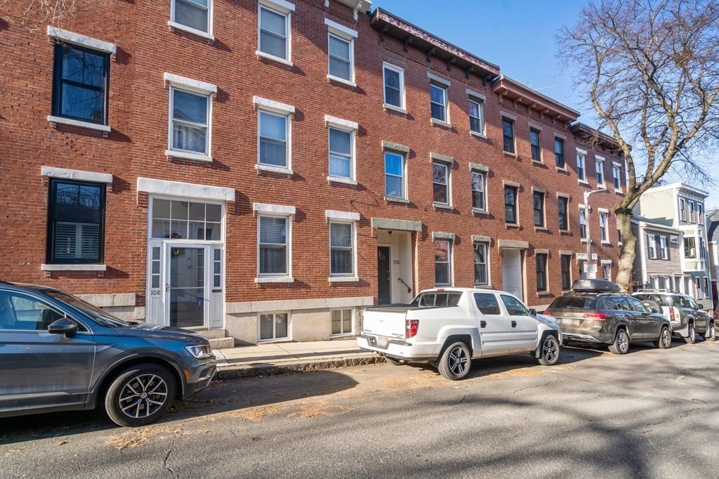 110 Elm Street, Unit 1 Boston, MA 02129 - Photo 16 of 17 a car parked in front of a building