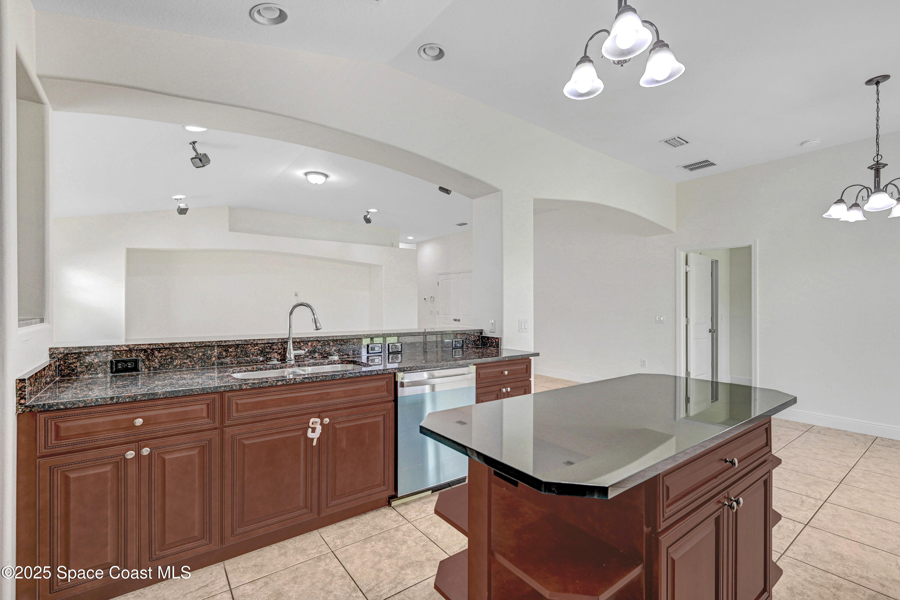 4031 Brantley Circle Rockledge, FL 32955 - Photo 13 of 41 a kitchen with a counter space cabinets and appliances