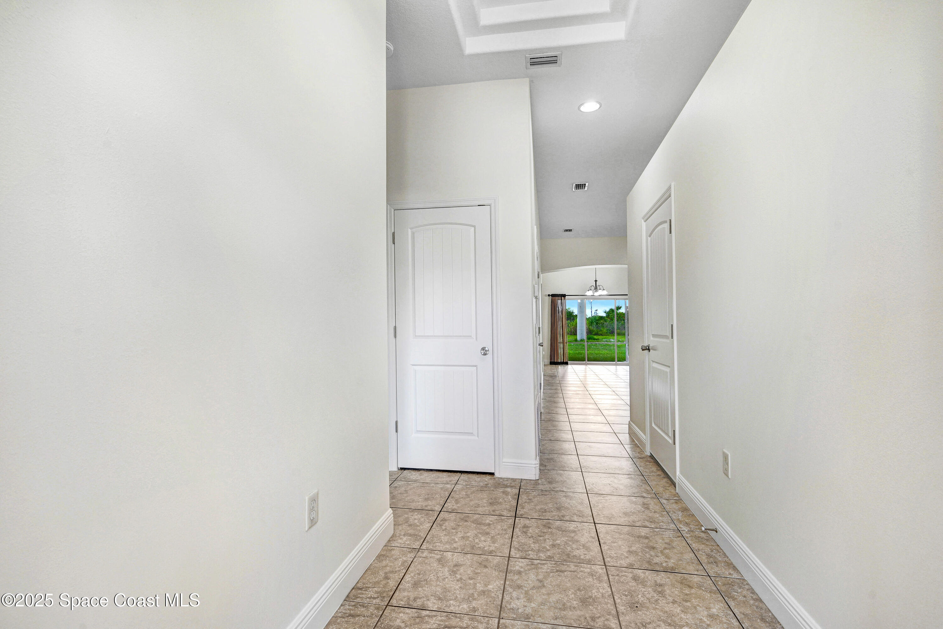 4031 Brantley Circle Rockledge, FL 32955 - Photo 26 of 41 a view of hallway with wooden floor