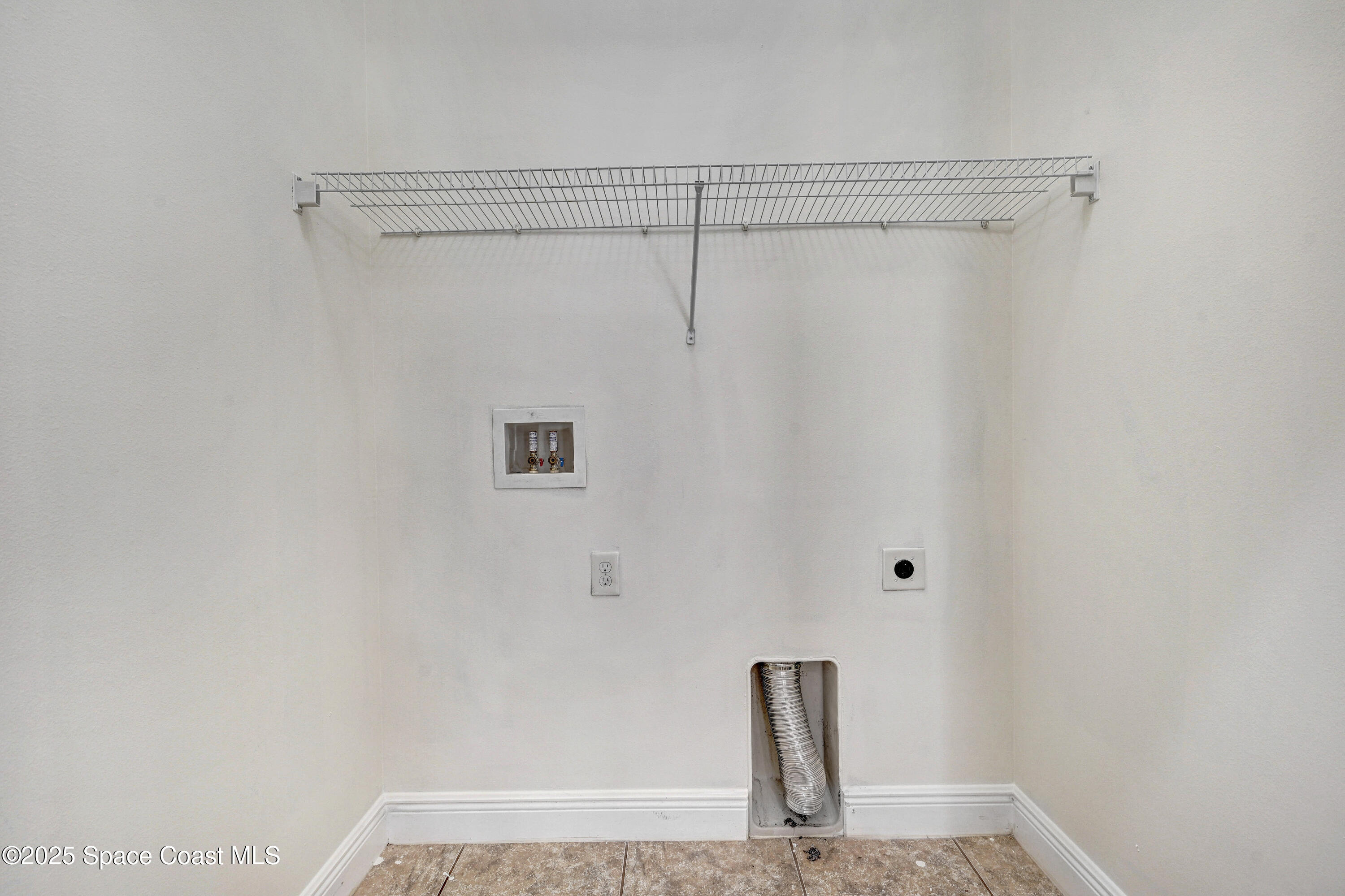 4031 Brantley Circle Rockledge, FL 32955 - Photo 31 of 41 a view of small space with racks on the wall