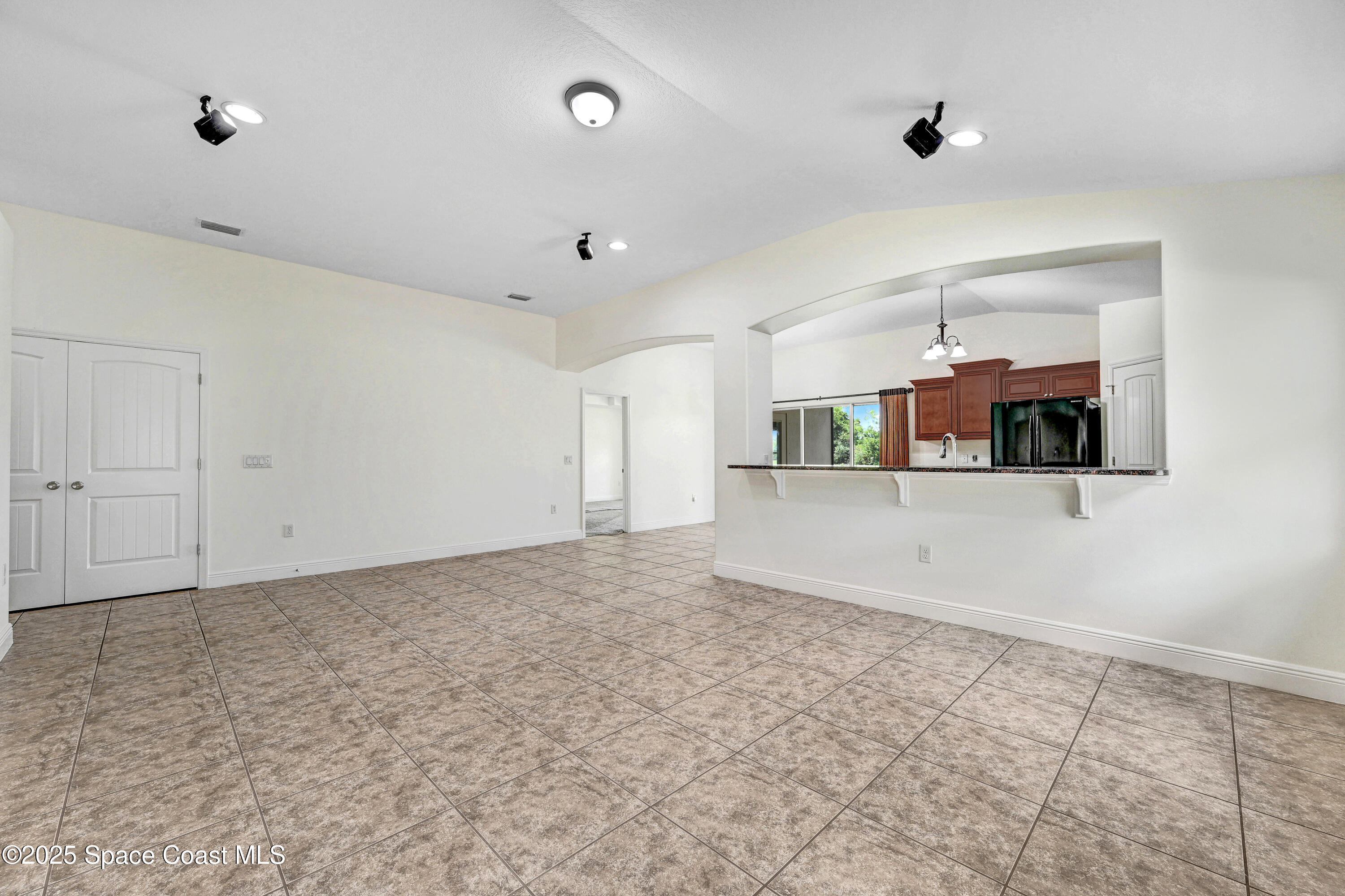 4031 Brantley Circle Rockledge, FL 32955 - Photo 32 of 41 a view of a room with a ceiling fan and window