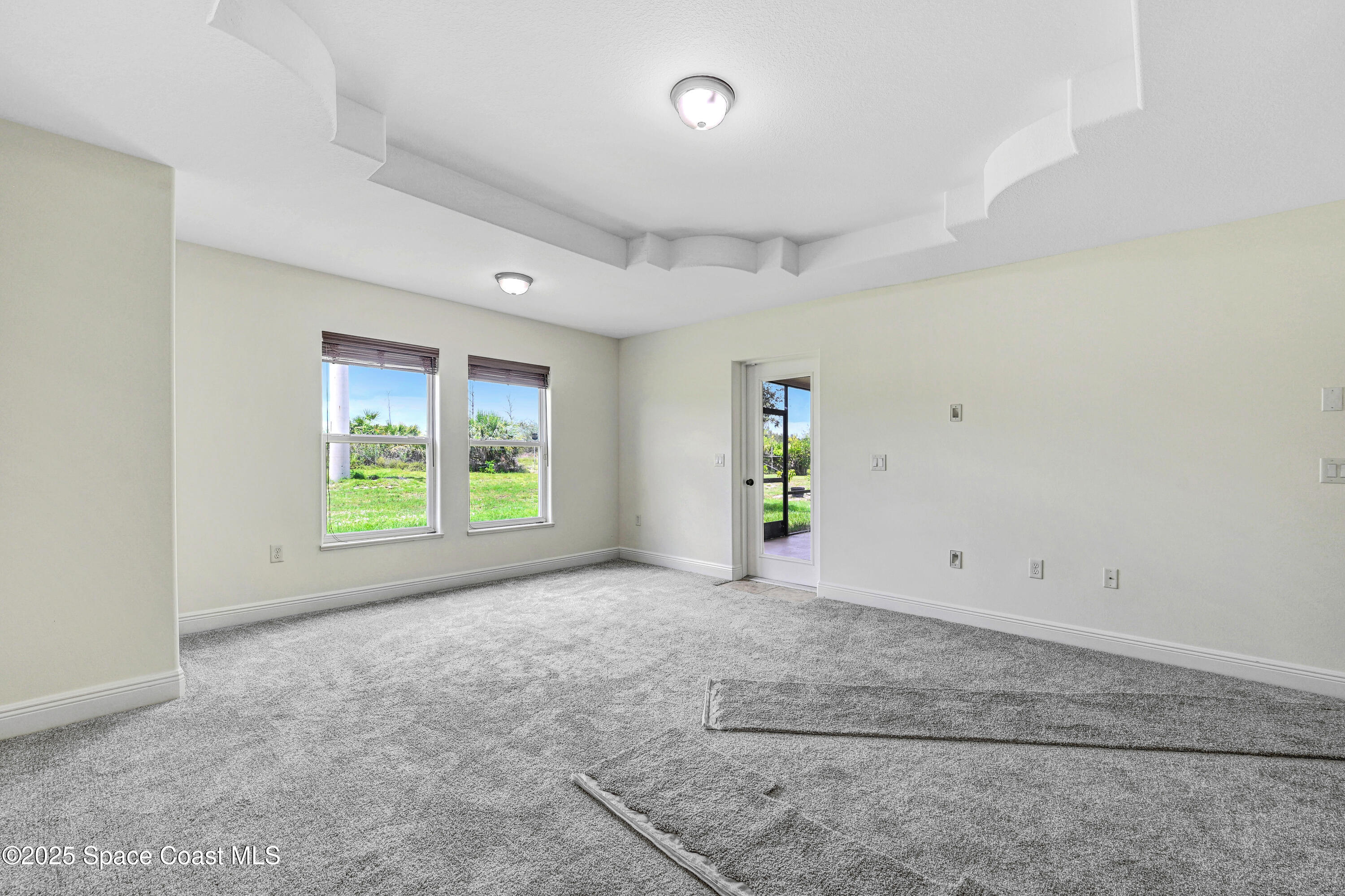 4031 Brantley Circle Rockledge, FL 32955 - Photo 37 of 41 an empty room with windows