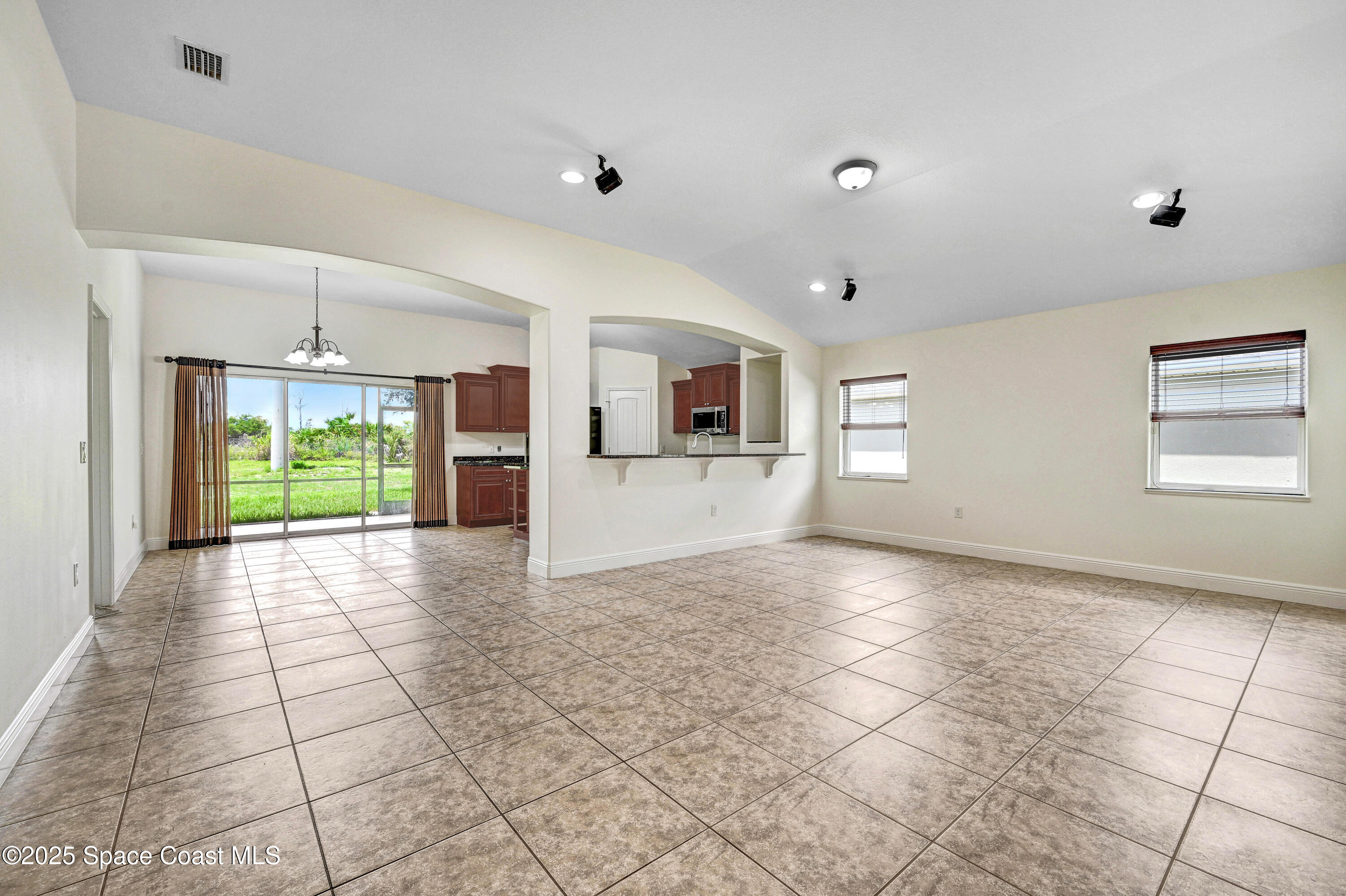4031 Brantley Circle Rockledge, FL 32955 - Photo 6 of 41 a view of a kitchen with a sink and a stove top oven