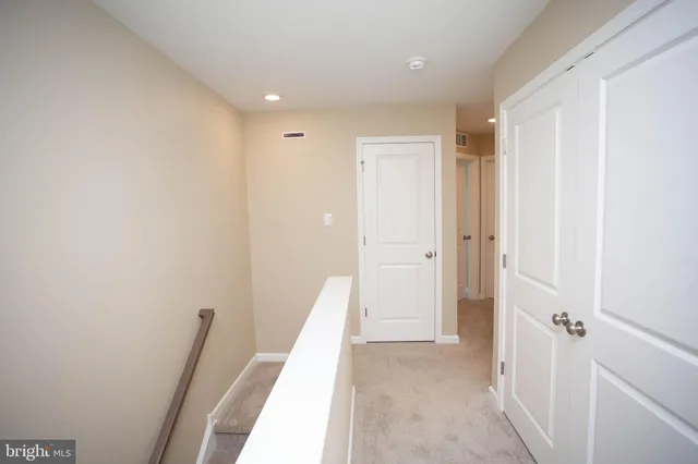 a bathroom with a sink double vanity and a bathtub