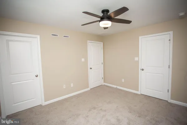 a bathroom with a sink a mirror and a shower