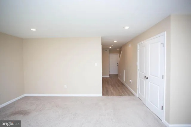 a view of livingroom with hardwood floor and a ceiling fan