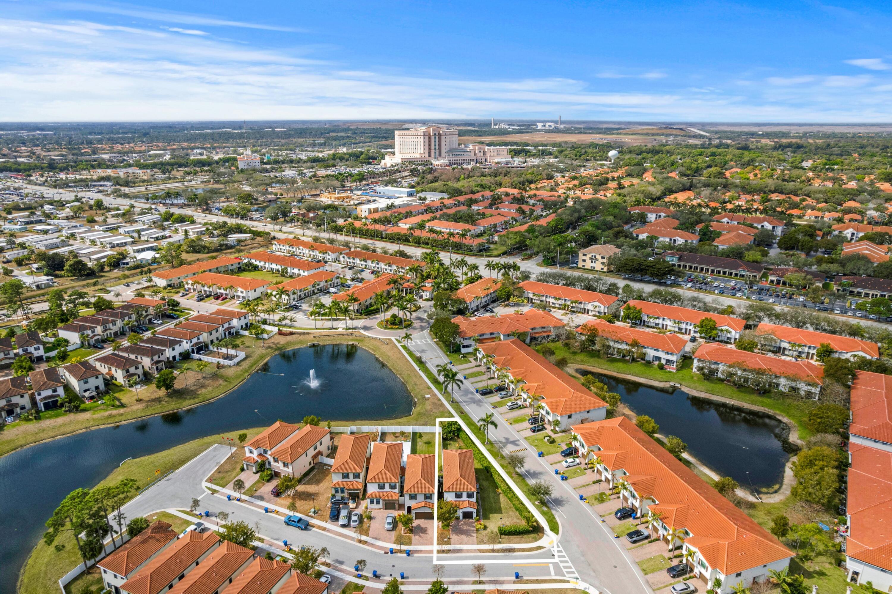 4021 Sycamore Cove Riviera Beach, FL 33410 - Photo 36 of 37 an aerial view of residential houses with outdoor space