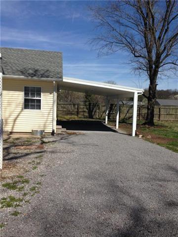 301 Bugscuffle Road Wartrace, TN 37183 - Photo 3 of 9 1 car attached carport on the rear of home