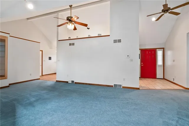 an empty room with windows