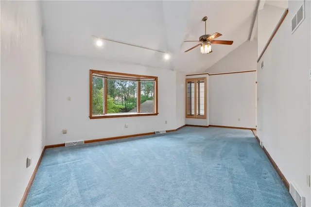 an empty room with windows