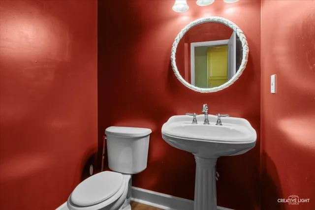 a view of entryway with wooden floor and stairs