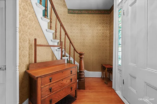 a view of walk in closet with clothes