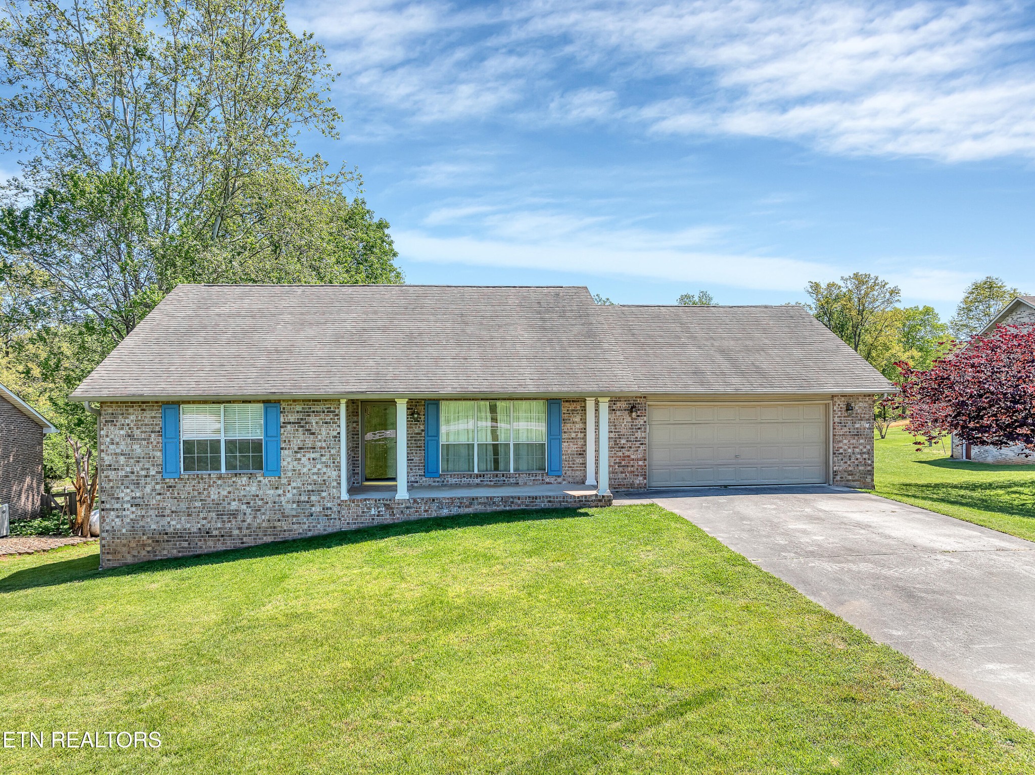 2036 Little Best Road Maryville, TN 37803 - Photo 1 of 54 front view of a house with a yard