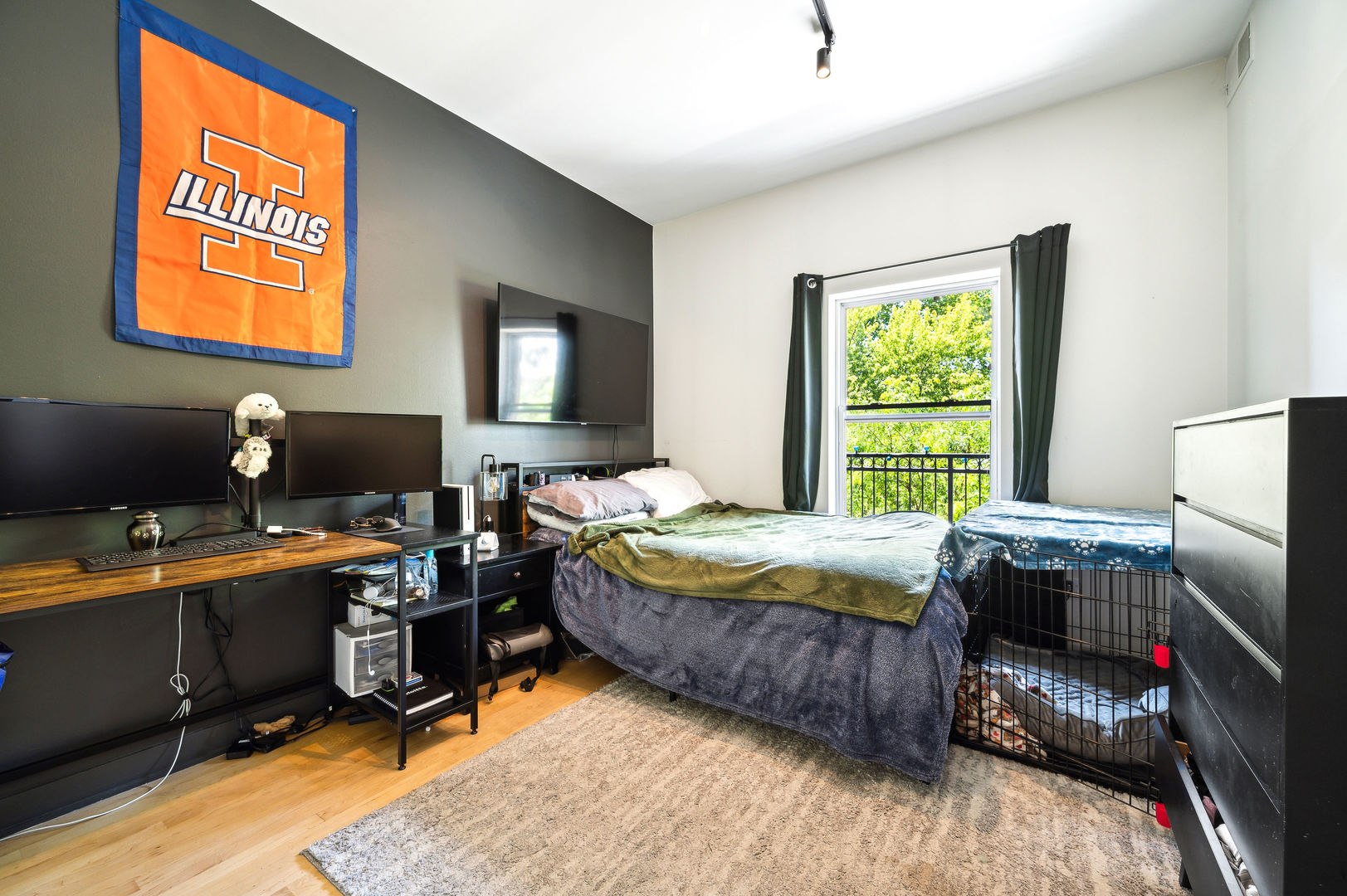4311 North Sheridan Road, Unit 303 Chicago, IL 60613 - Photo 12 of 17 a bedroom with bed and a window