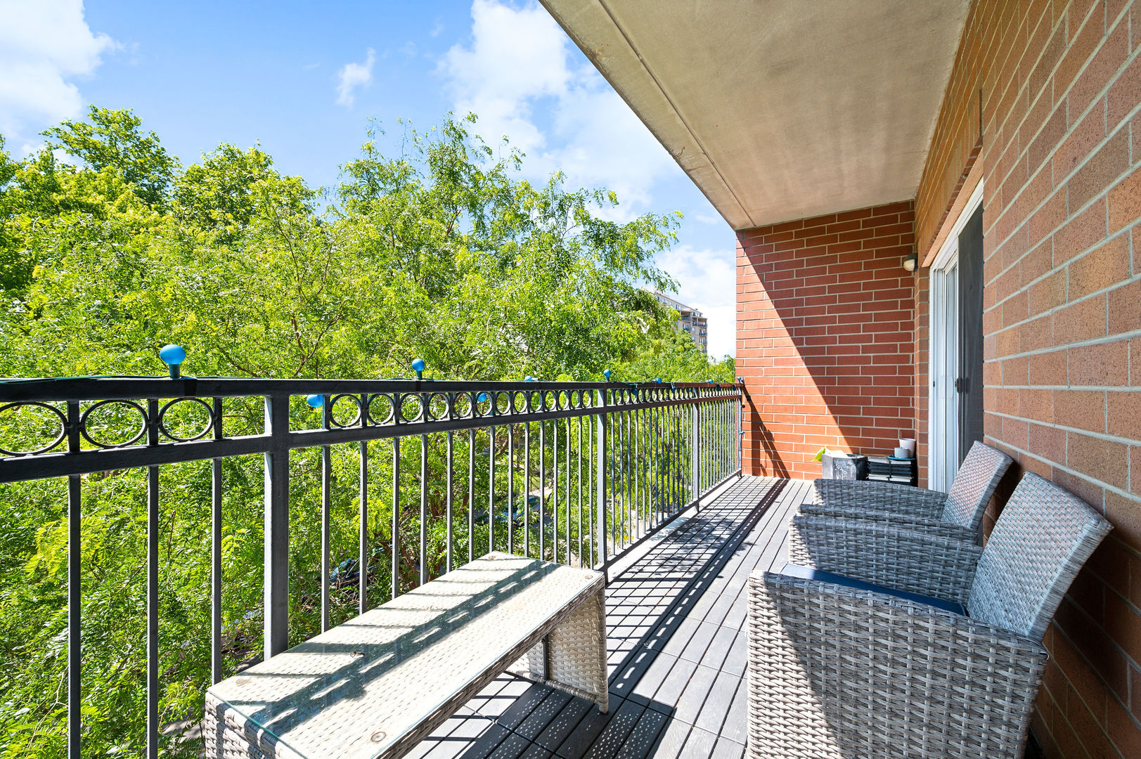 4311 North Sheridan Road, Unit 303 Chicago, IL 60613 - Photo 15 of 17 a balcony with wooden floor