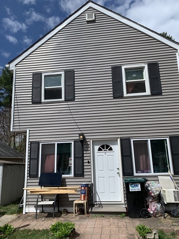 a front view of a house with garage