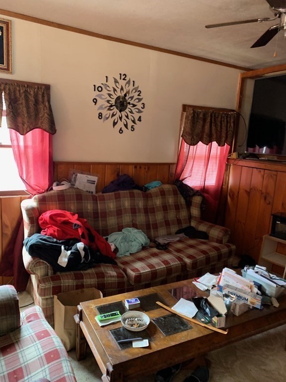 39 Evergreen Road Norton, MA 02766 - Photo 8 of 25 a bed room with a bed and a couch