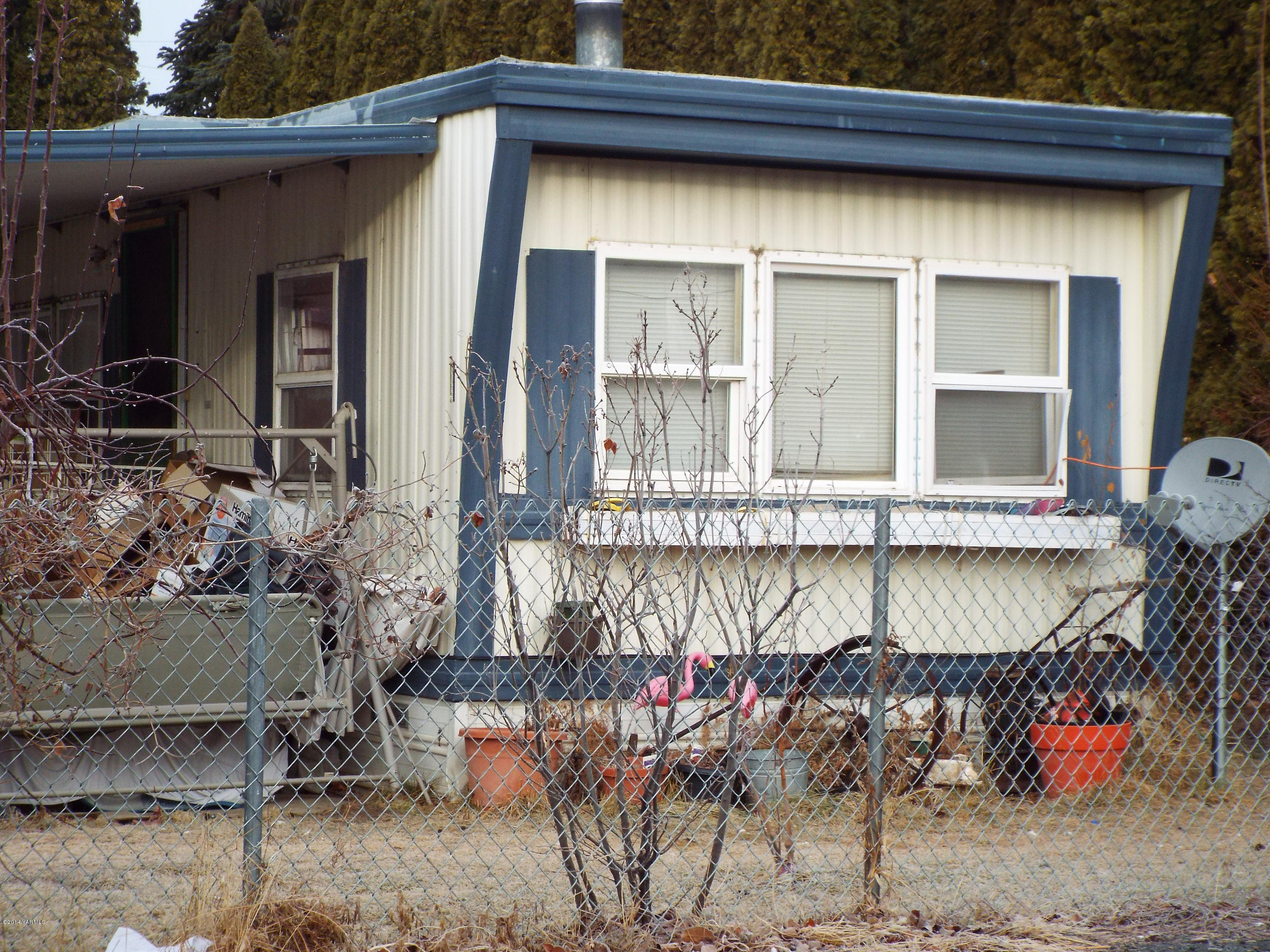 110 Sage Trail Road, Unit 1 Yakima, WA 98901 - Photo 1 of 1 a front view of a house with a garage