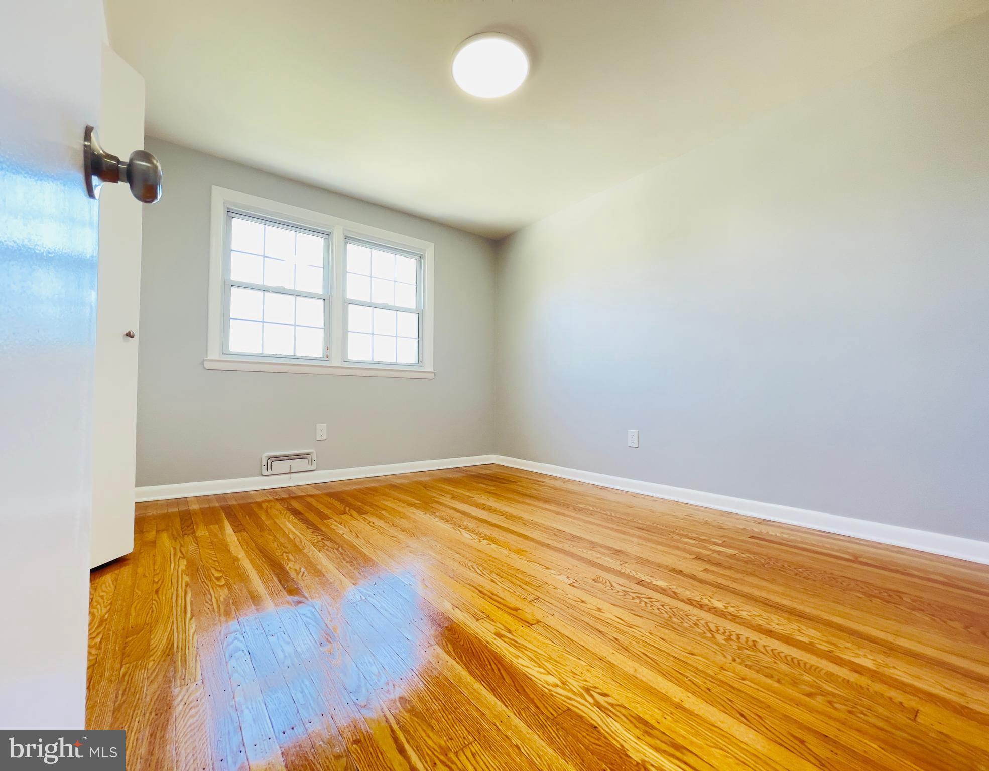54 Saratoga Road Stratford, NJ 08084 - Photo 25 of 34 a view of a room with wooden floor and fan