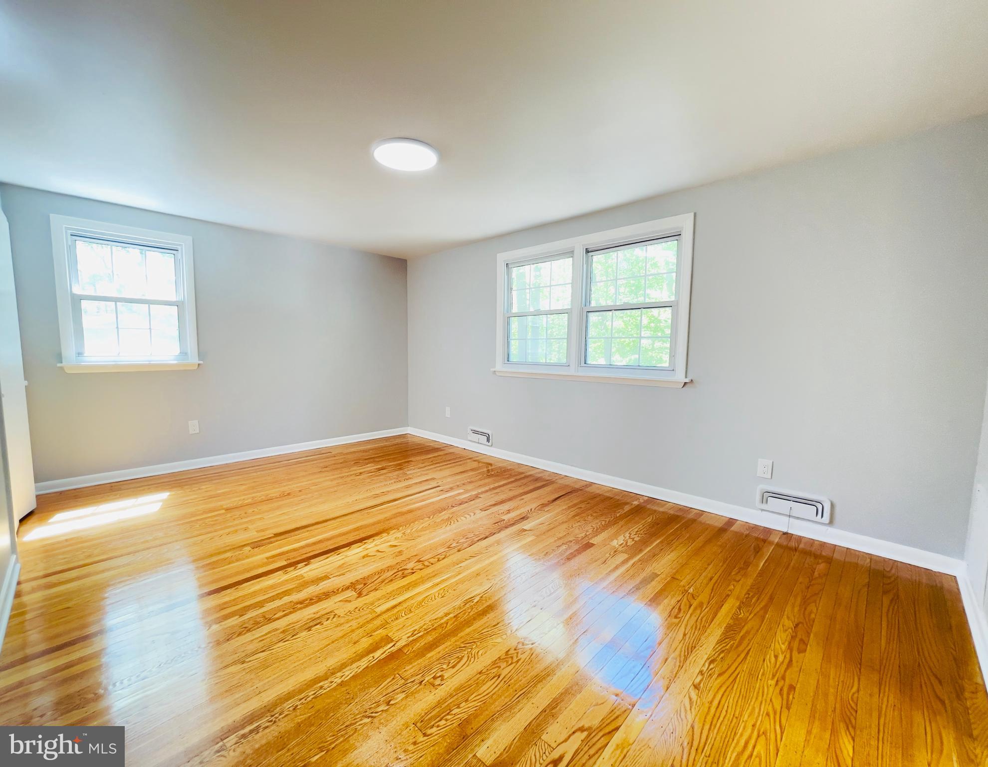 54 Saratoga Road Stratford, NJ 08084 - Photo 27 of 34 a view of empty room with wooden floor