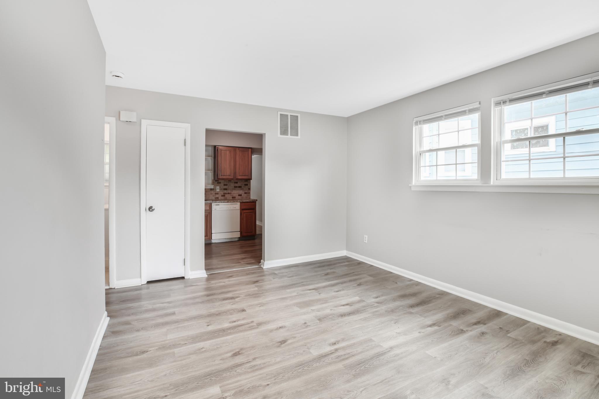 430 Richey Avenue, Unit 2B Oaklyn, NJ 08107 - Photo 2 of 15 Living room view to hall and kitchen